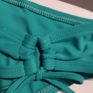 Body glove teal green bikini bottom New with tags size large tie at hips